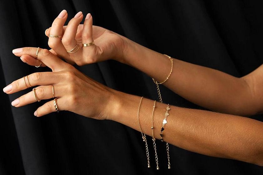 Woman hands is going to do the best way to sell jewelry