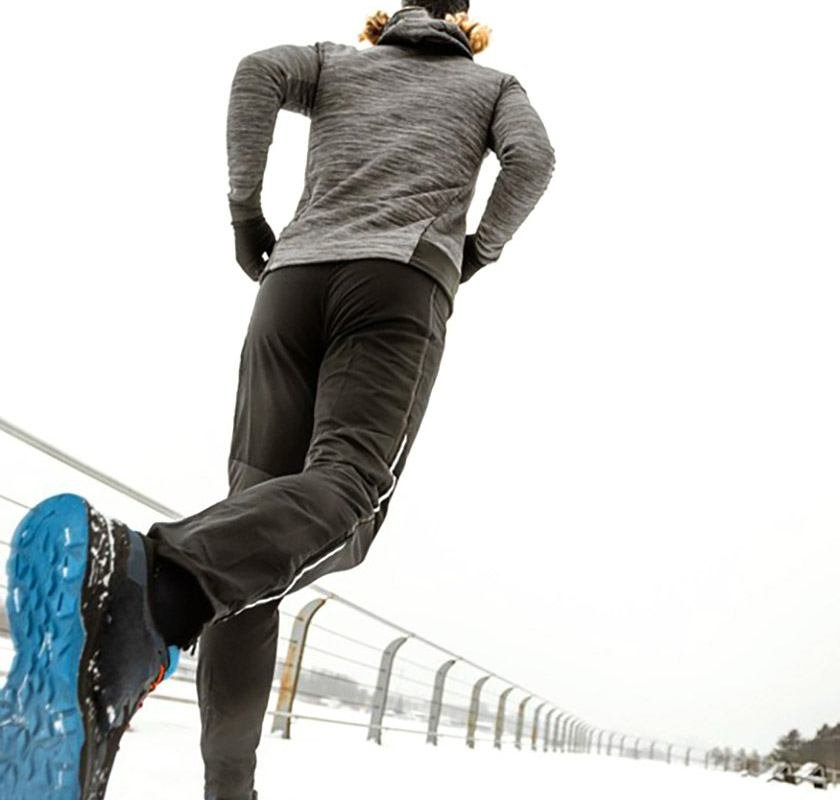 Bottom photo of a man running in cold weather