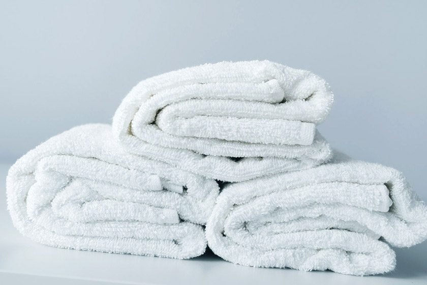 Three whites folded into three towels