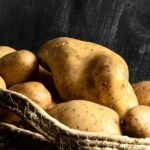 Close-up picture of potatoes in a basket which can be the best way to store potatoes