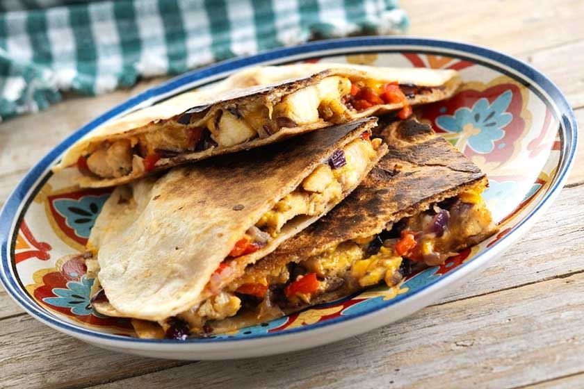 Cooked tortilla on a plate can be part of one of the best way to warm corn tortillas