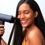 A woman uses the best way to dry hair