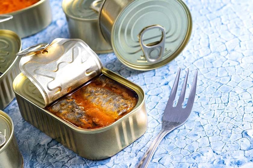 Canned sardines and fork