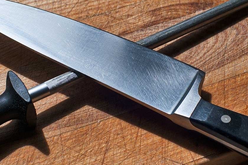 A knife and honing steel are part of the process of the best way to sharpen kitchen knives