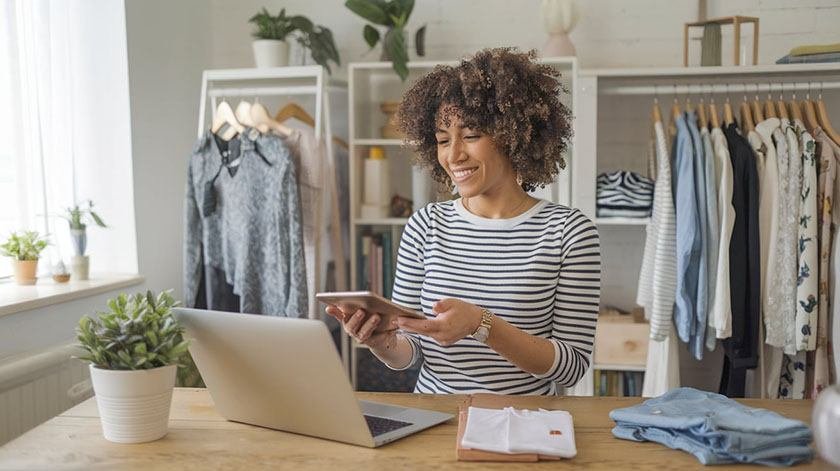 A woman trying to sell her clothes online