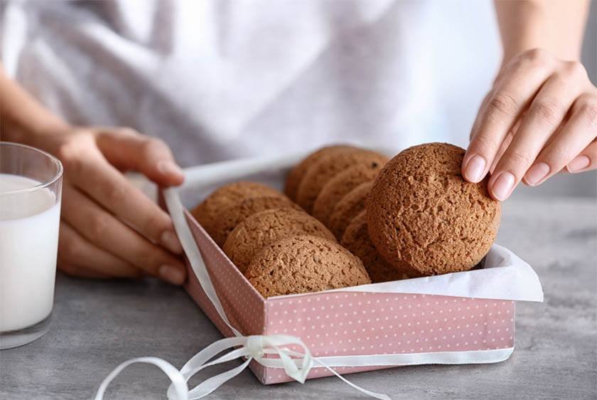 A woman performs the best way to ship cookies