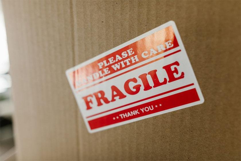 A cardboard box that says fragile